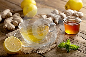 Ginger tea with lemon hot served photo